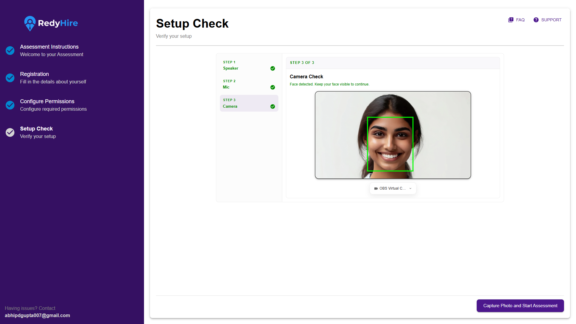 Camera Check screen with a live camera preview and a face-detection frame.
